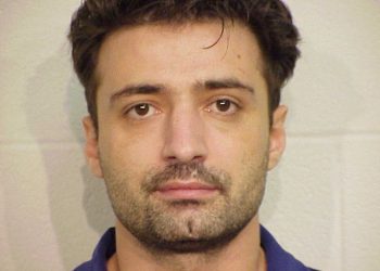 mugshot of yllu didani in 2015 arrest in us