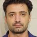 mugshot of yllu didani in 2015 arrest in us