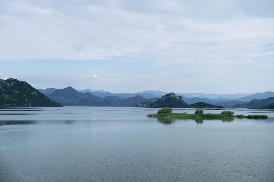 a large body of water surrounded by mountains