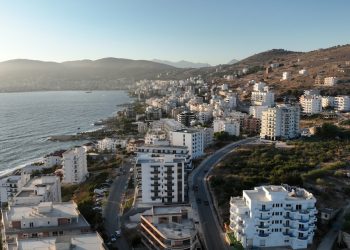 Coastal city with buildings along the sea