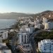 Coastal city with buildings along the sea