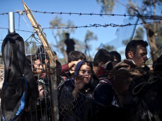 Refugjatët në itinerarin e Ballkanit. Foto: BETA/AP