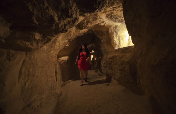 A Japanese tourist visits the inside of the Great Pyramid, built by Cheops, known locally as Khufu in Giza, Egypt, Thursday, June 2, 2016. A scientific team scanning the Great Pyramid aimed at discovering the famed pharaonic monument's secrets including possible hidden burial chambers. (AP Photo/Amr Nabil)