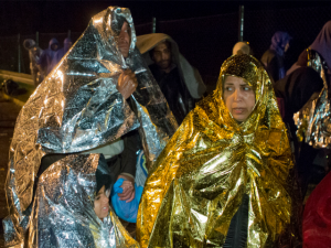 Një familje refugjatësh në kufi me Sloveninë. | Foto: Darko Bandic/BETA AP